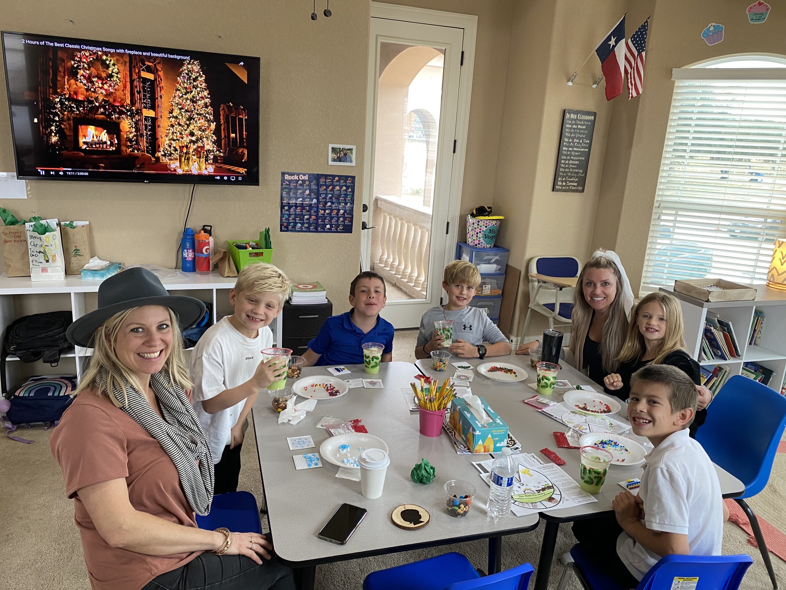 Students and parents working on art projects.